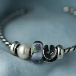 TROLLBEADS UENDELIG SØLVKUGLE - TAGBE-20090